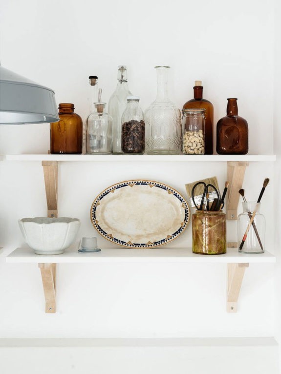 small white shelves with wood brackets. / sfgirlbybay