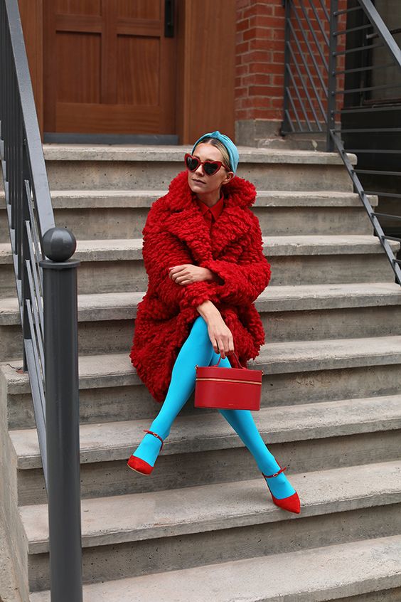 Blair Eadie wearing a red teddy coat and bright tights // Click through for details on an exclusive NET-A-PORTER shoe sale and for more bright Fall looks